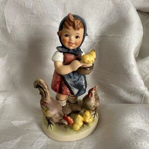 Hummel Figurine “Feeding Time” Has original packaging.